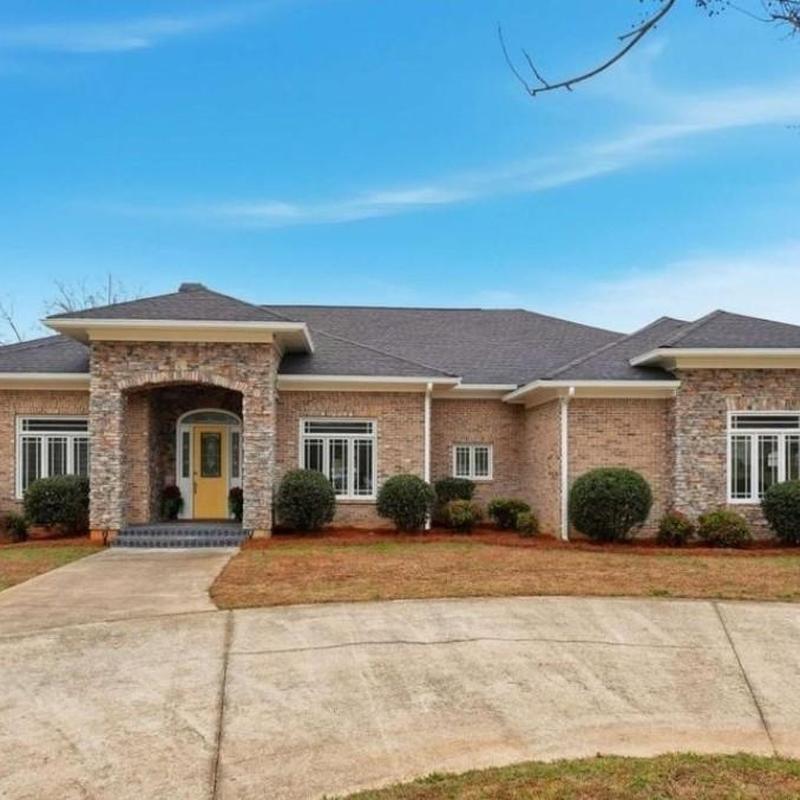 Asphalt shingle roof on brick residential home