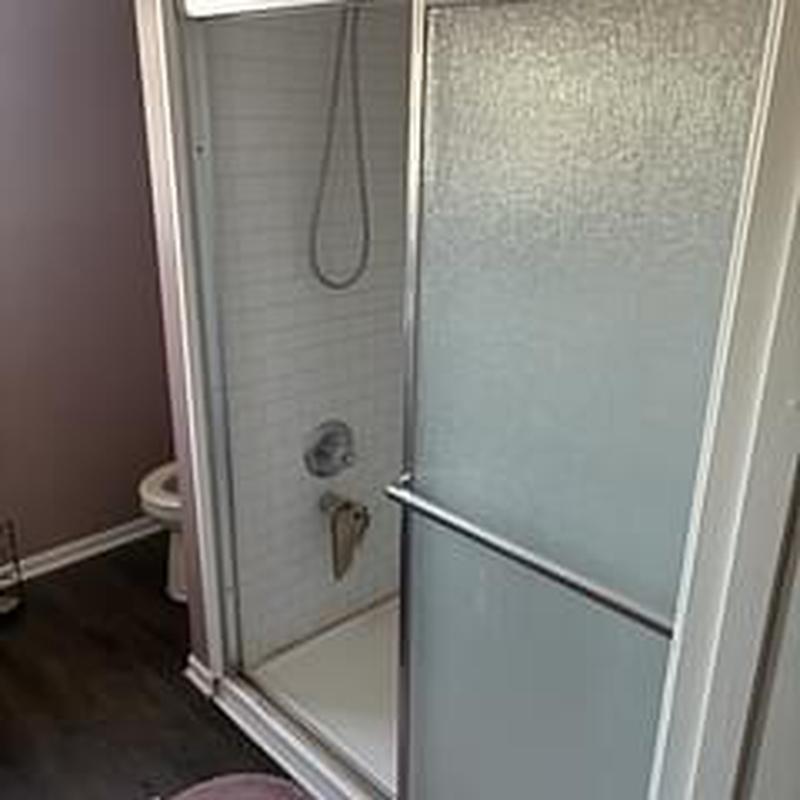 Shower door and caulking with sealant issues