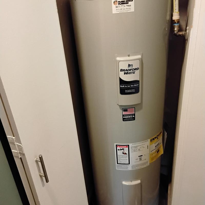 Water heater installation with plumbing upgrades in closet