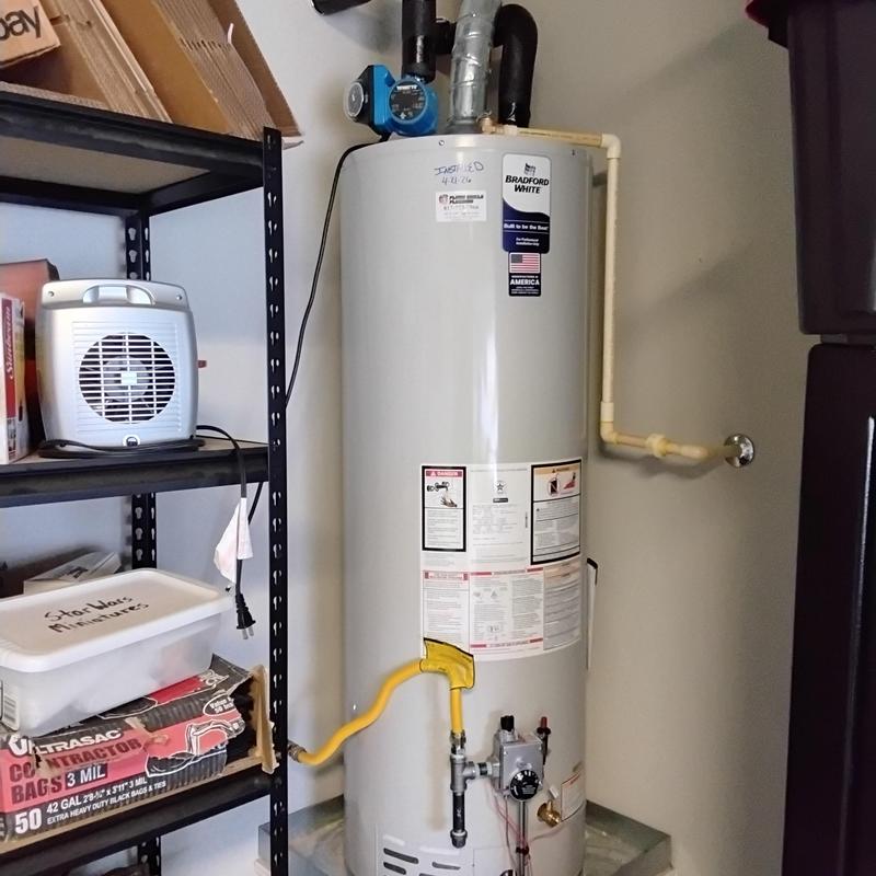Gas water heater installation with code upgrades