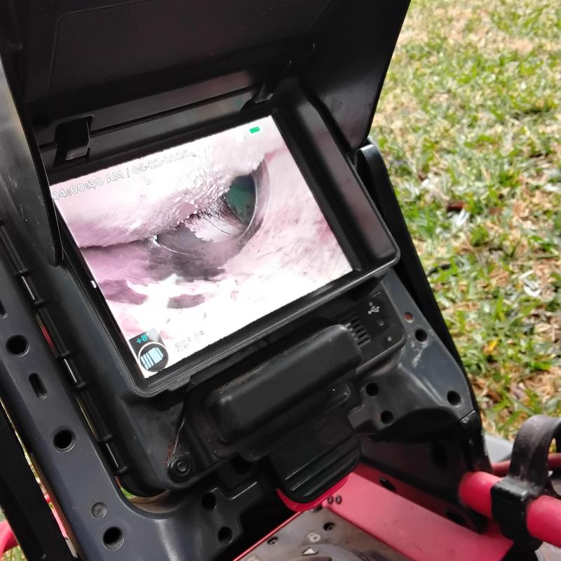 Main sewer line camera inspection with grease buildup