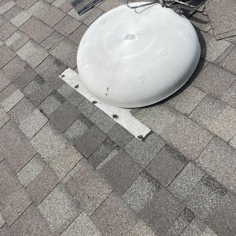 Roof vent flashing removal on asphalt shingle roof