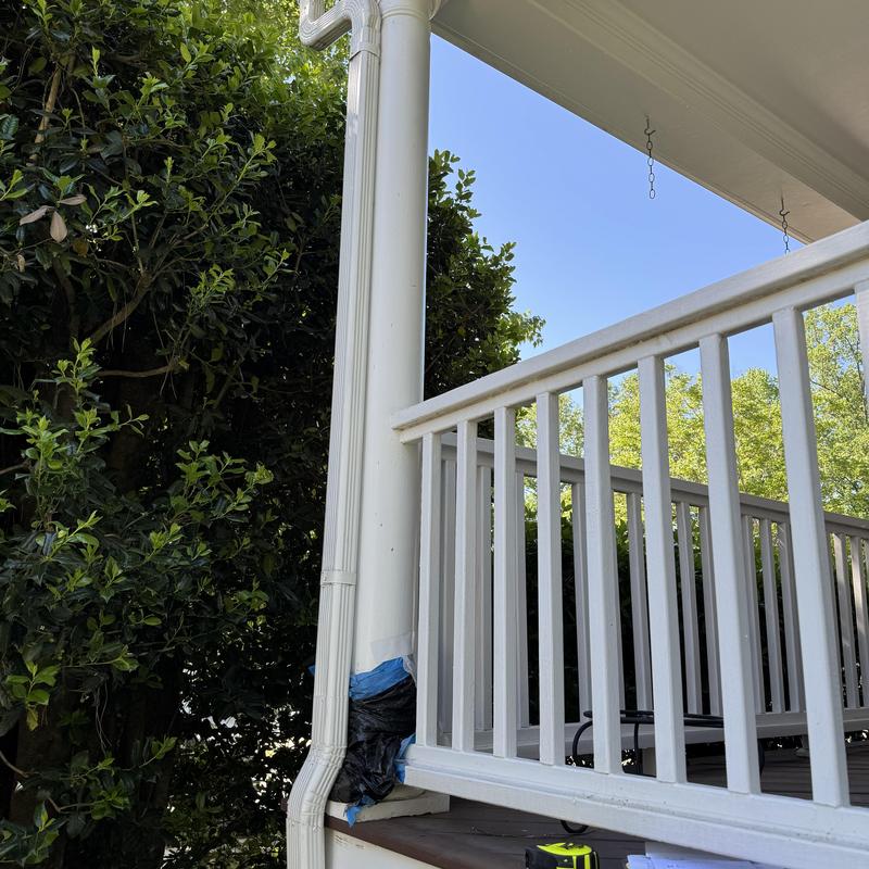 Porch column replacement with white railing and gutter Porch column replacement with white railing and gutter