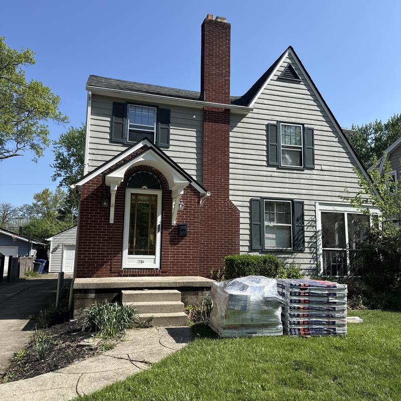 GAF Timberline HDC shingles stacked for roof replacement