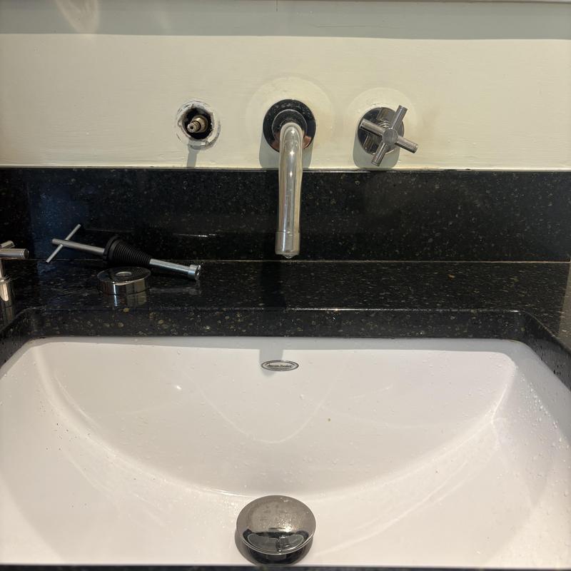 Waterworks faucet with disassembled handle and cartridge