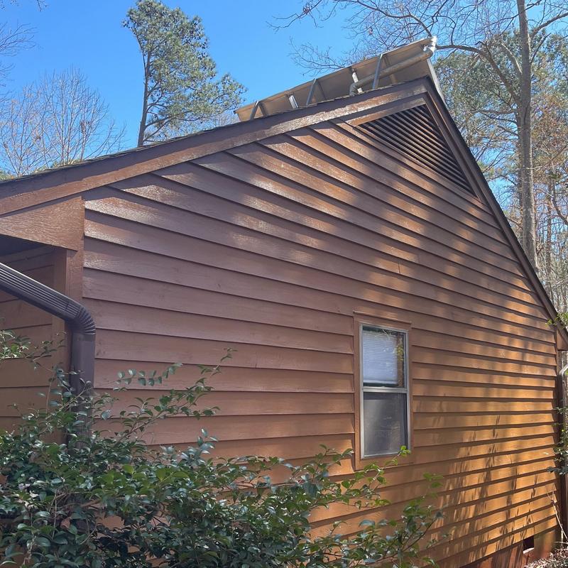 Wood siding installation on residential house exterior Wood siding installation on residential house exterior