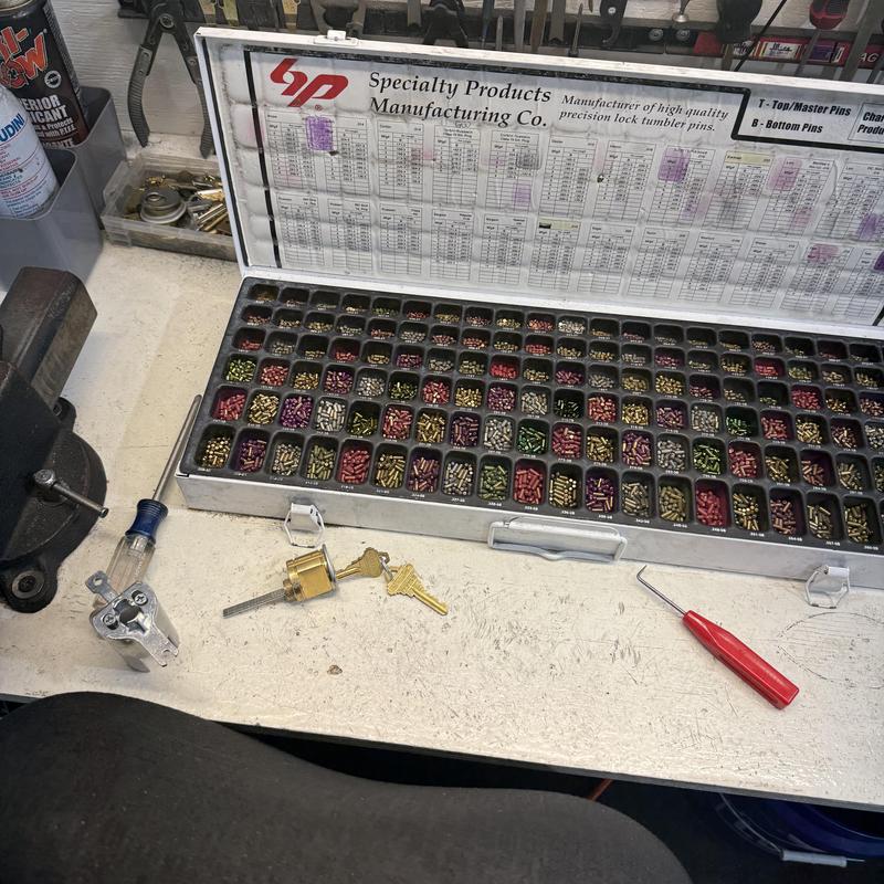 Lock tumbler pin kit with rekeyed lock and keys