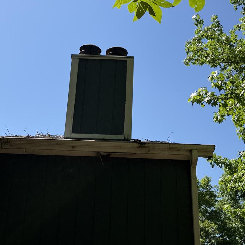 Chimney flashing and soffit area roof inspection