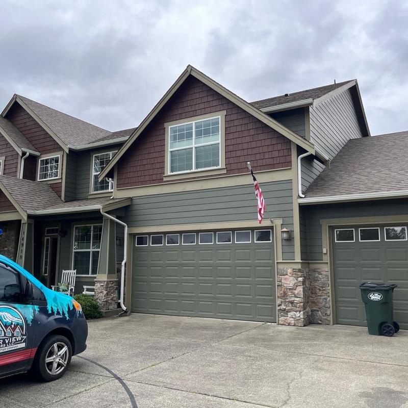 Asphalt shingle roof on two-story home in Hayden, ID