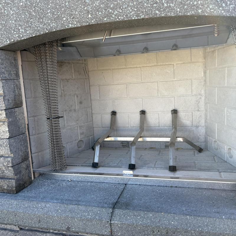 Fireplace insert frame and chimney liner inside firebox