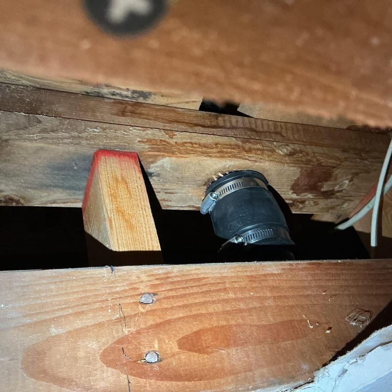 ABS drainage pipe with reinforced metal clamp connection
