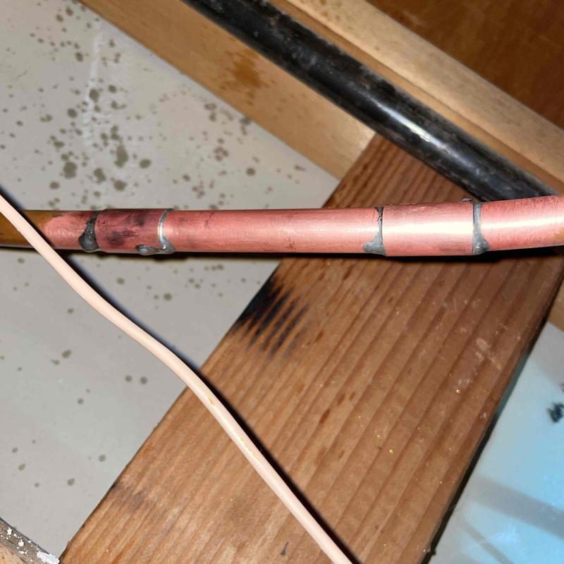 Type L copper pipe with soldered fittings in ceiling space