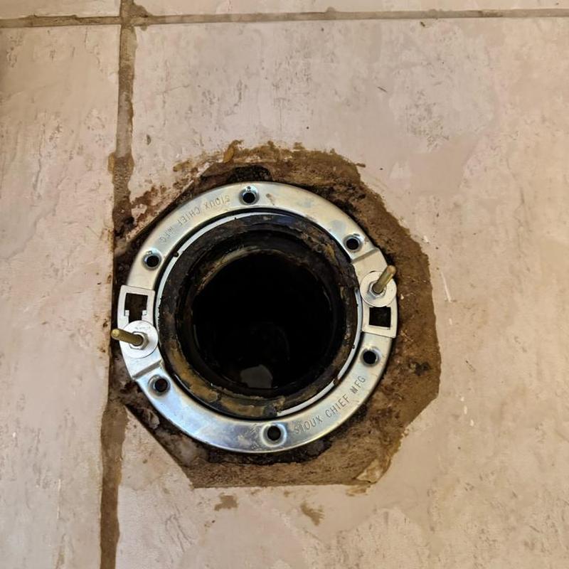 Toilet flange and drain pipe with rusted base repair