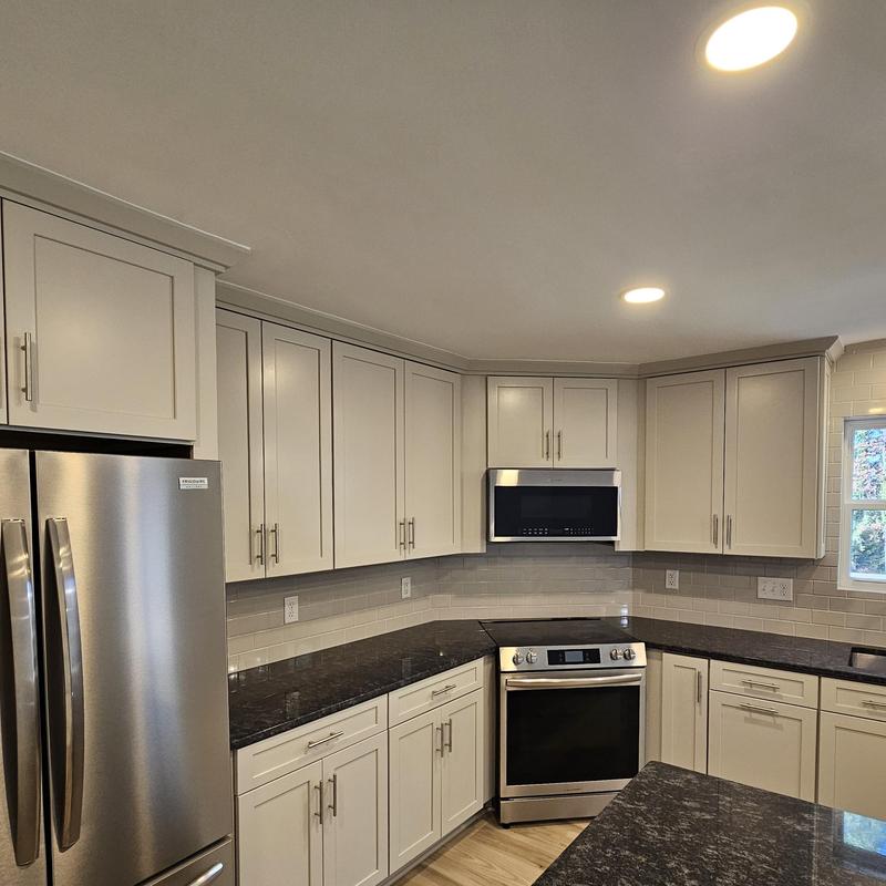 Kitchen cabinets and black granite countertops installation