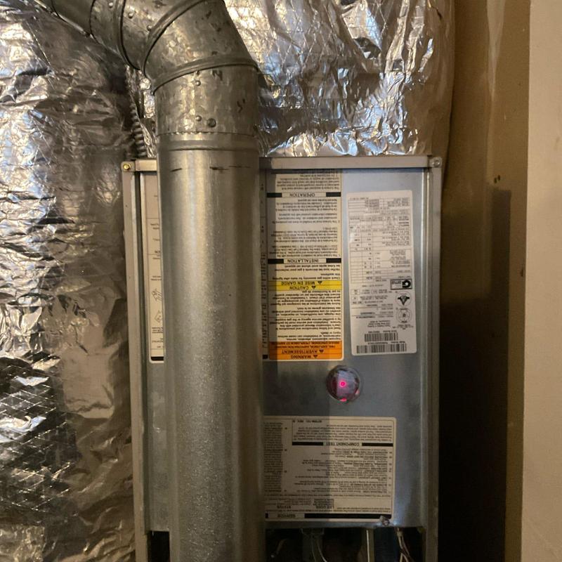 Inducer fan on 21-year-old furnace with vent pipe