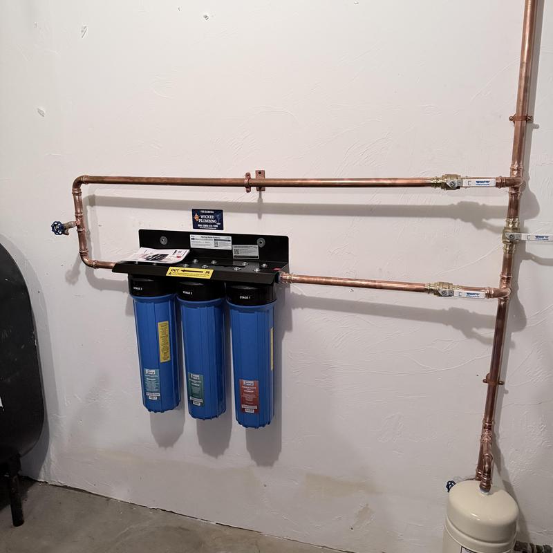 Water filter system with new copper piping and bypass