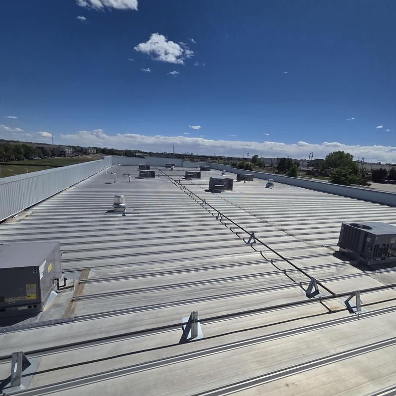 Roof-mounted HVAC units on commercial metal roof