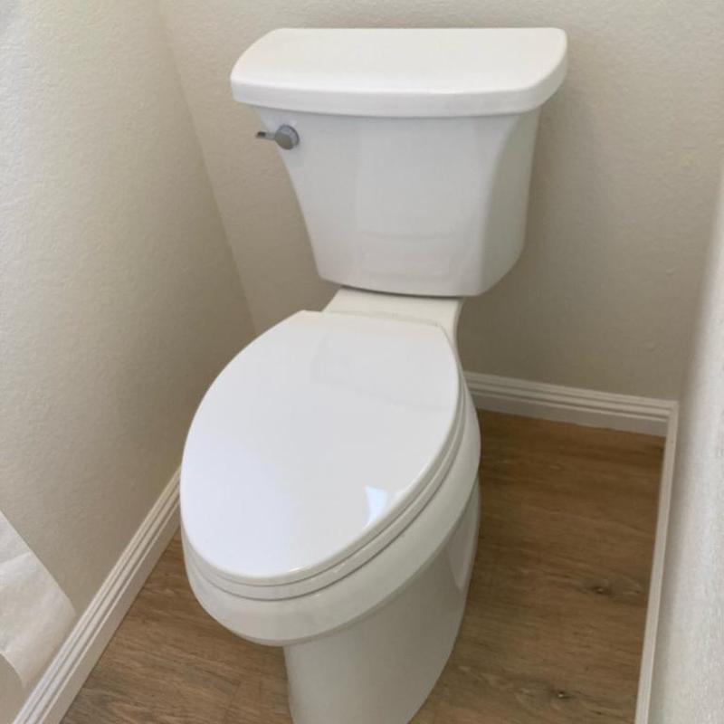 Kohler Highline Arc toilet installed with caulking