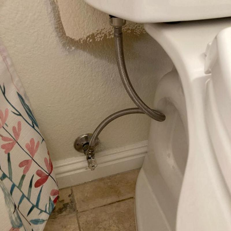 Toilet angle stop and fill hoses installed