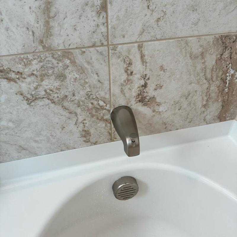 Brushed nickel slip style tub spout with diverter