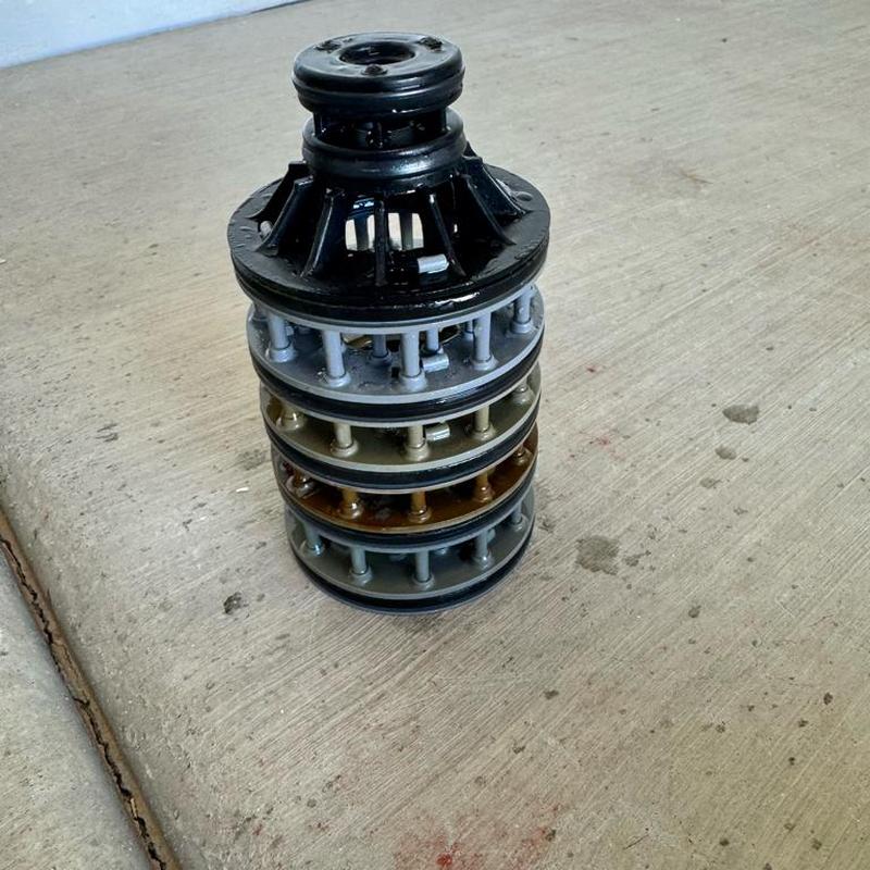 Water softener seal stack kit on concrete floor