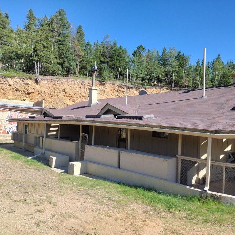 Shingle roof with chimney and ventilation pipes Shingle roof with chimney and ventilation pipes