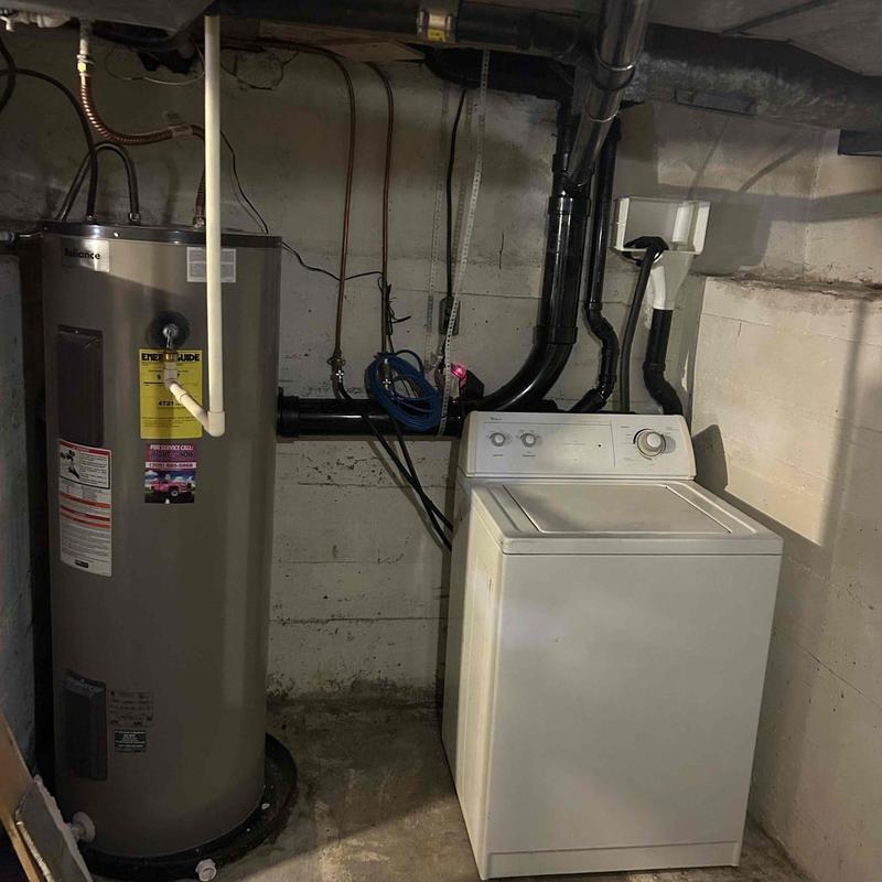 Water heater and washing machine drain and vent pipes