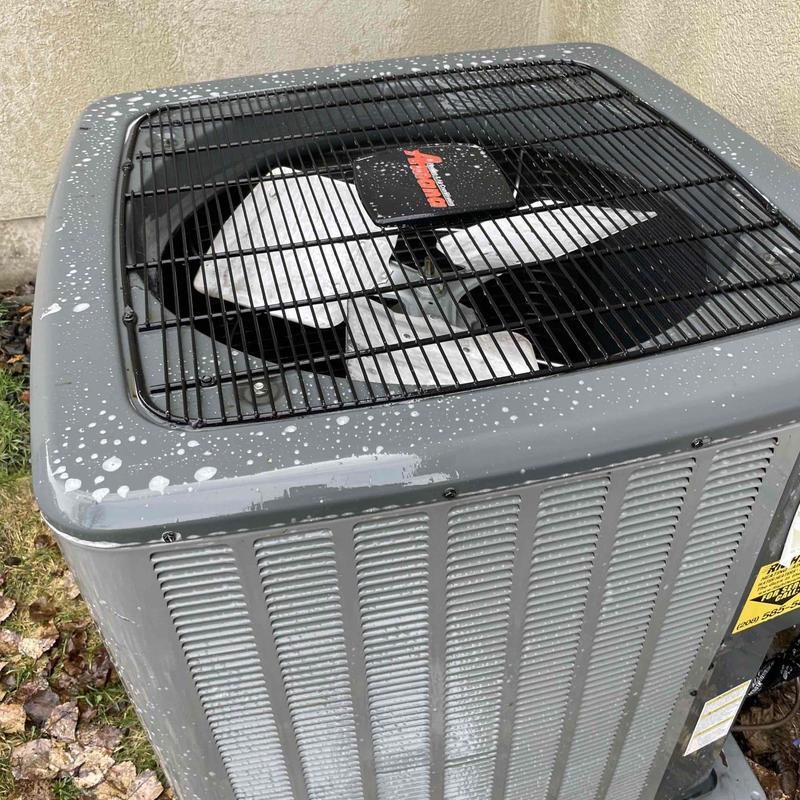 Air conditioner condenser unit with water droplets
