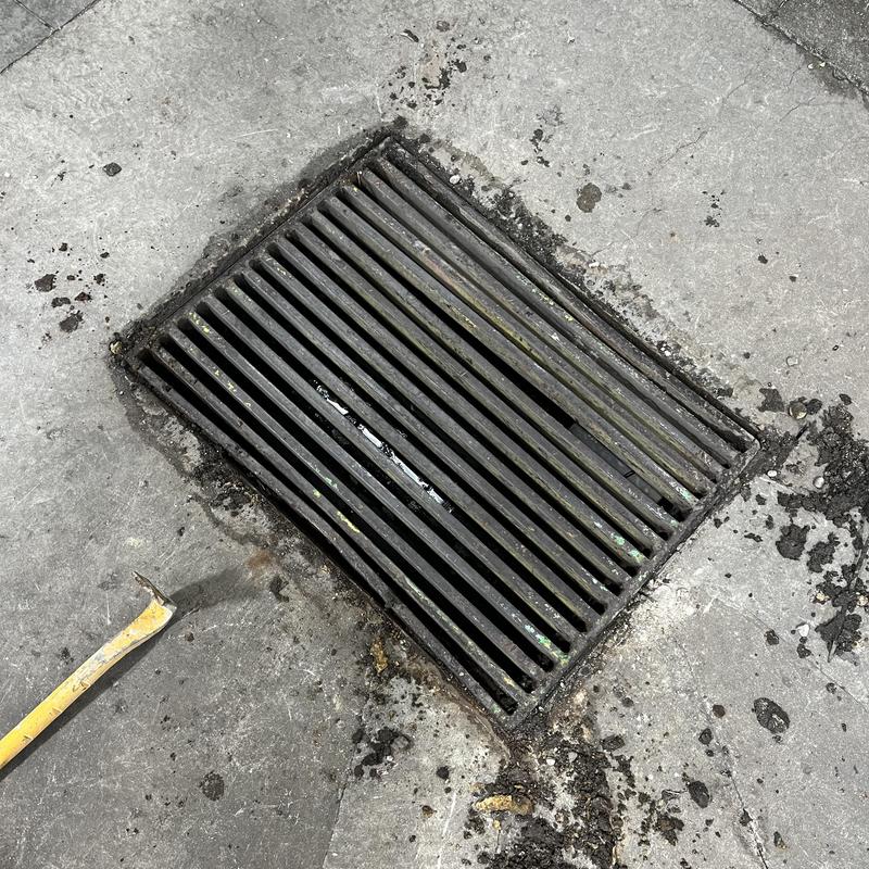 Truck wash bay drain sediment cleanup and inspection