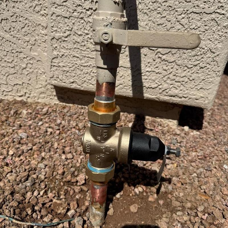 Pressure reducing valve with shutoff handle outdoors