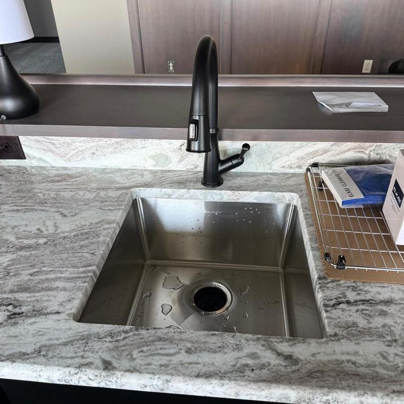 Kitchen sink and matte black faucet installation