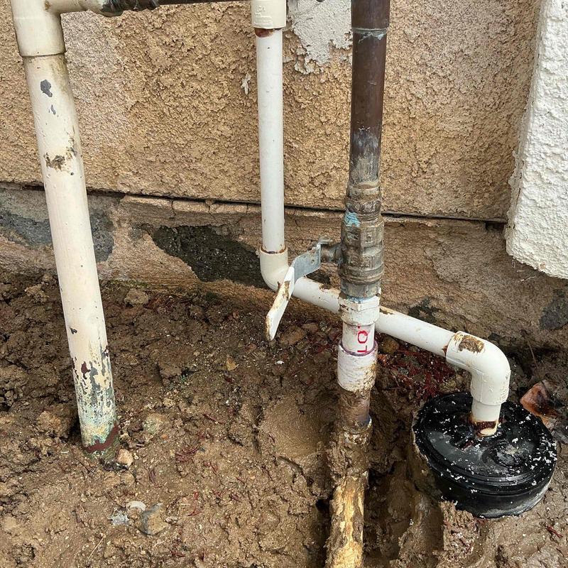 PVC plumbing pipe with new male adapter and coupling