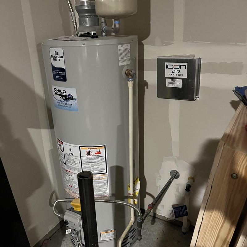 Water heater and connected ventilation system in basement
