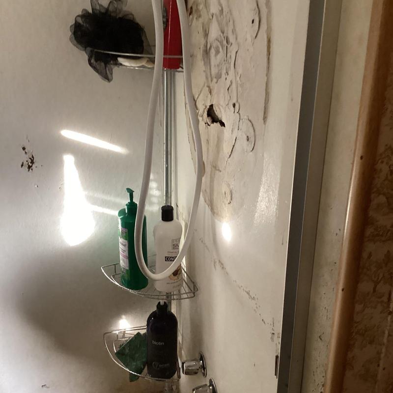 Three-handle shower valve with water diversion issue