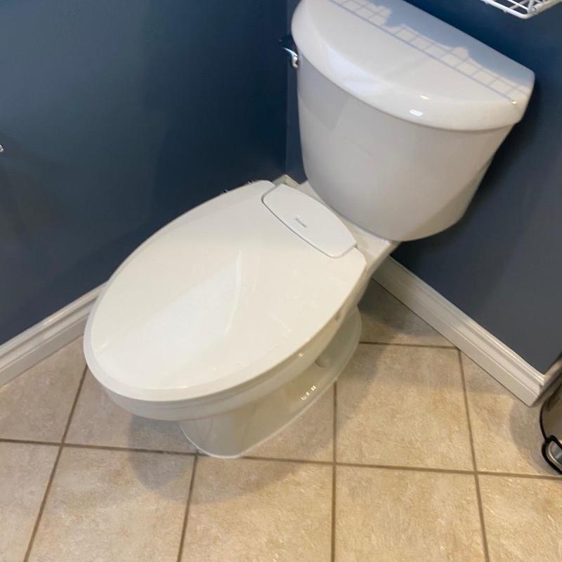 Toilet installation with new wax ring and bolts