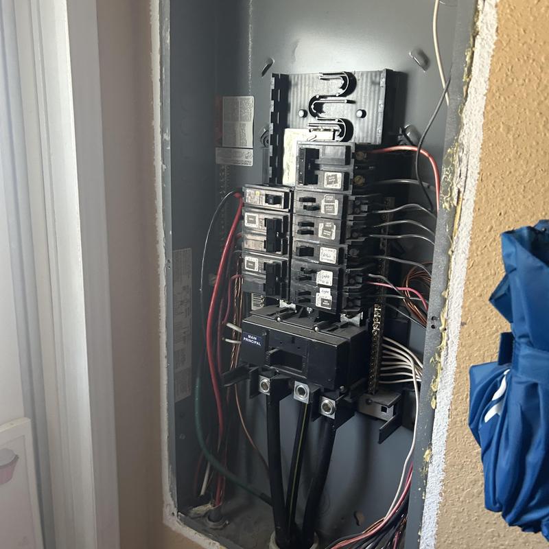 Electrical breaker panel wiring corrections in Nampa home