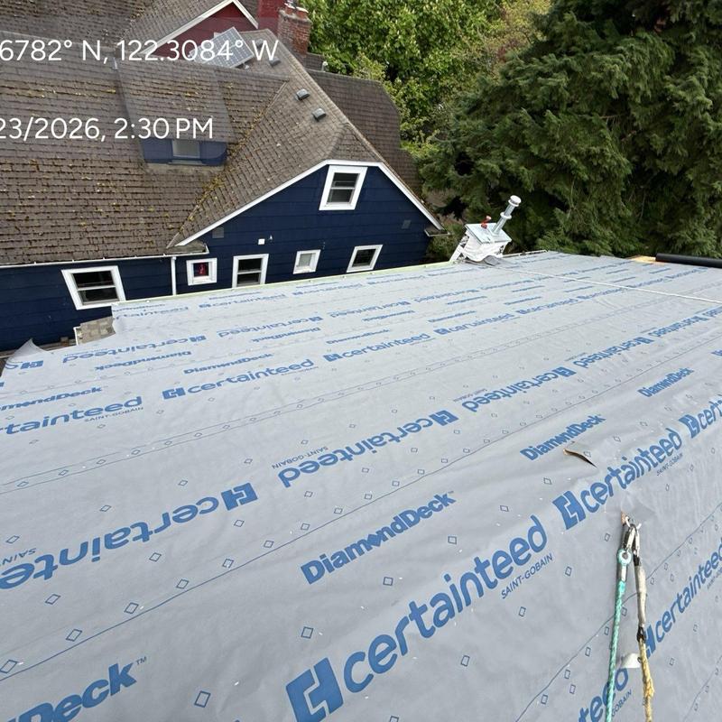 Roof underlayment installation on residential roof