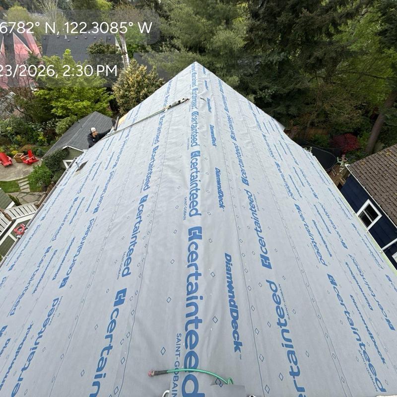 Roof underlayment installation on steep residential roof