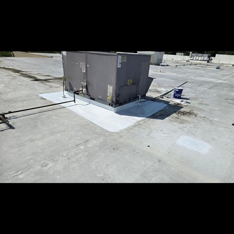 Flat TPO roof patching around rooftop HVAC unit Flat TPO roof patching around rooftop HVAC unit