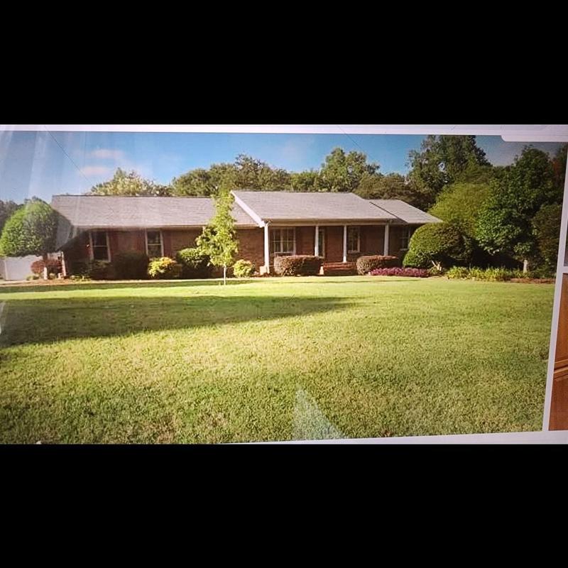 Owens Corning shingle roof on brick home exterior Owens Corning shingle roof on brick home exterior