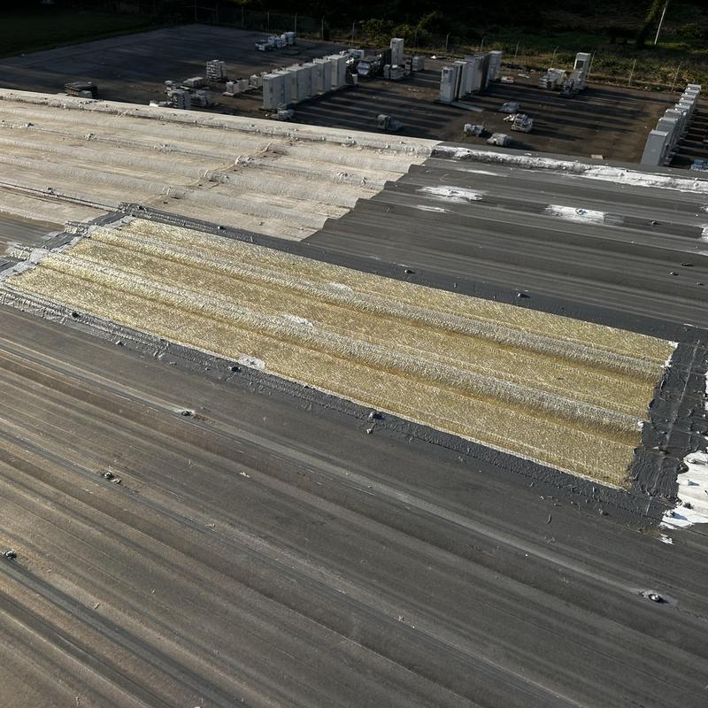 Galvanized ridge vent hood installation on metal roof