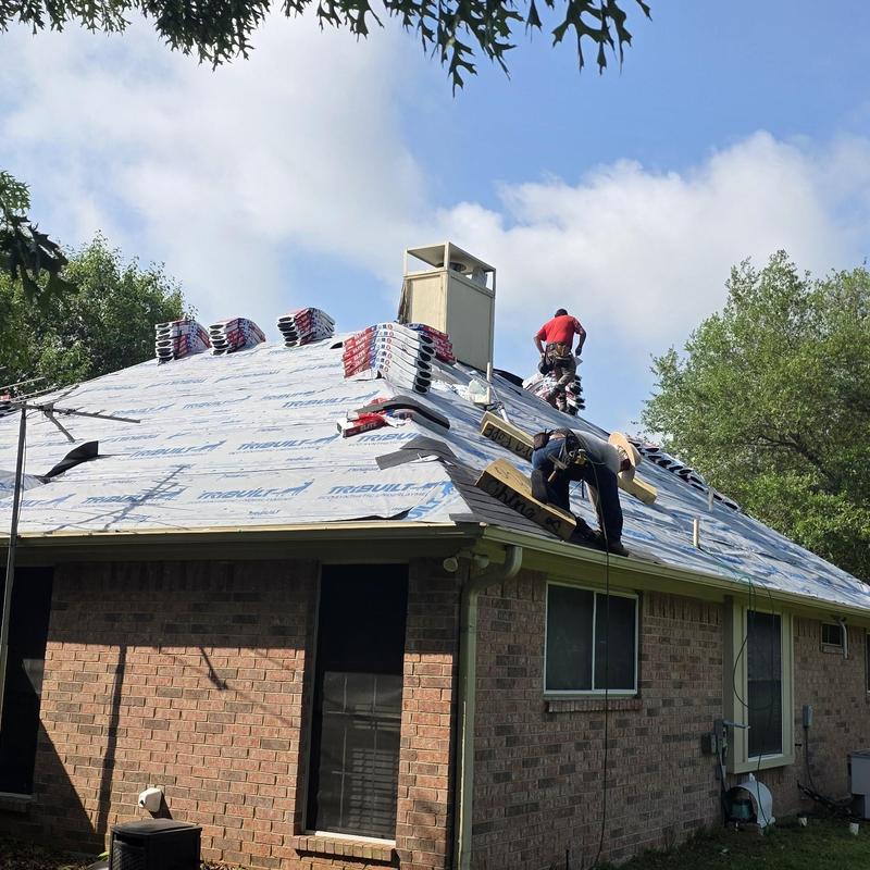 Asphalt shingles installation on hail-damaged roof