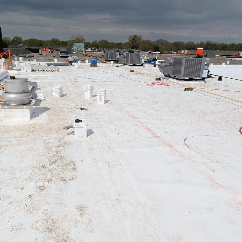TPO single ply roof restoration on flat commercial roof