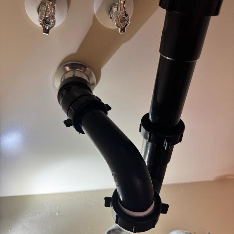 Kitchen sink drain pipes and angle stop valves installation