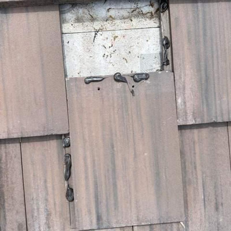 Concrete tile roof with sealant on repair area