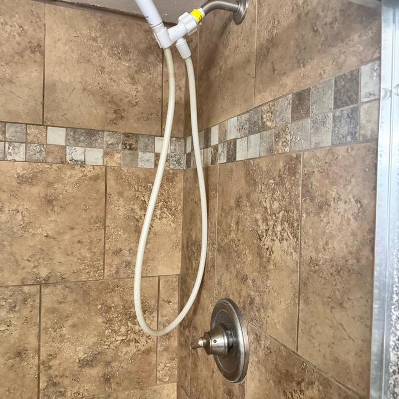 Shower cartridge valve with hose and tile surround