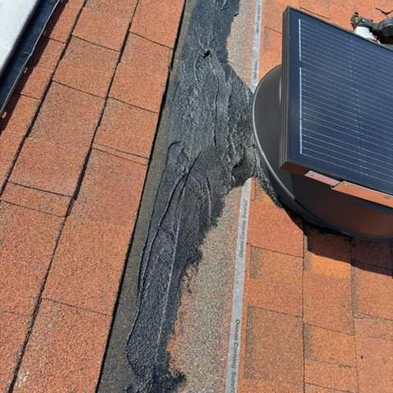 Kennedy solar exhaust attic fan on shingle roof