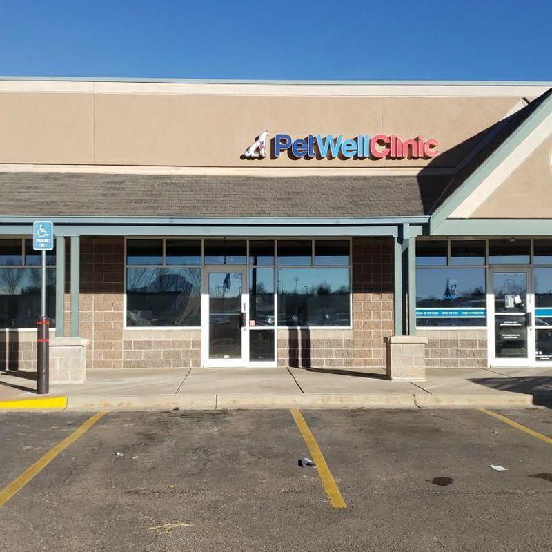 Retail storefront exterior with PetWell Clinic signage