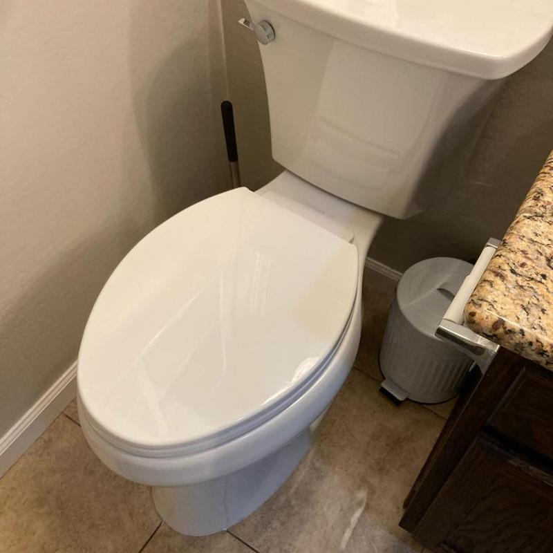 Kohler Highline toilet installation in bathroom corner