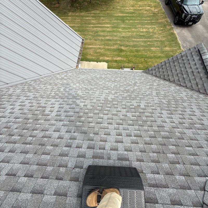 Asphalt shingle roof with hail damage inspection view